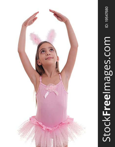 Half length studio portrait of a girl wearing ballerina outfit and rabbit ears looking up isolated on white background. Half length studio portrait of a girl wearing ballerina outfit and rabbit ears looking up isolated on white background