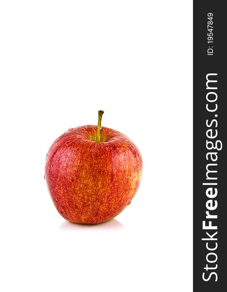 Fresh apple on isolated white background. healthy red delicious apple has drops of water.