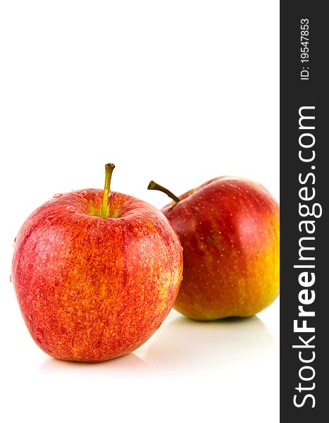 Fresh apple on isolated white background. healthy red delicious apple has drops of water.