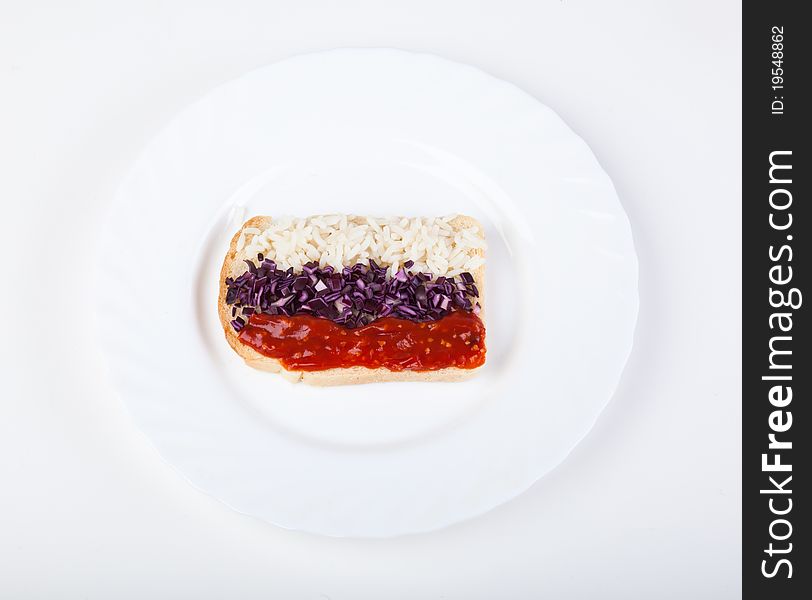 Sandwich with flag of Russia on a plate