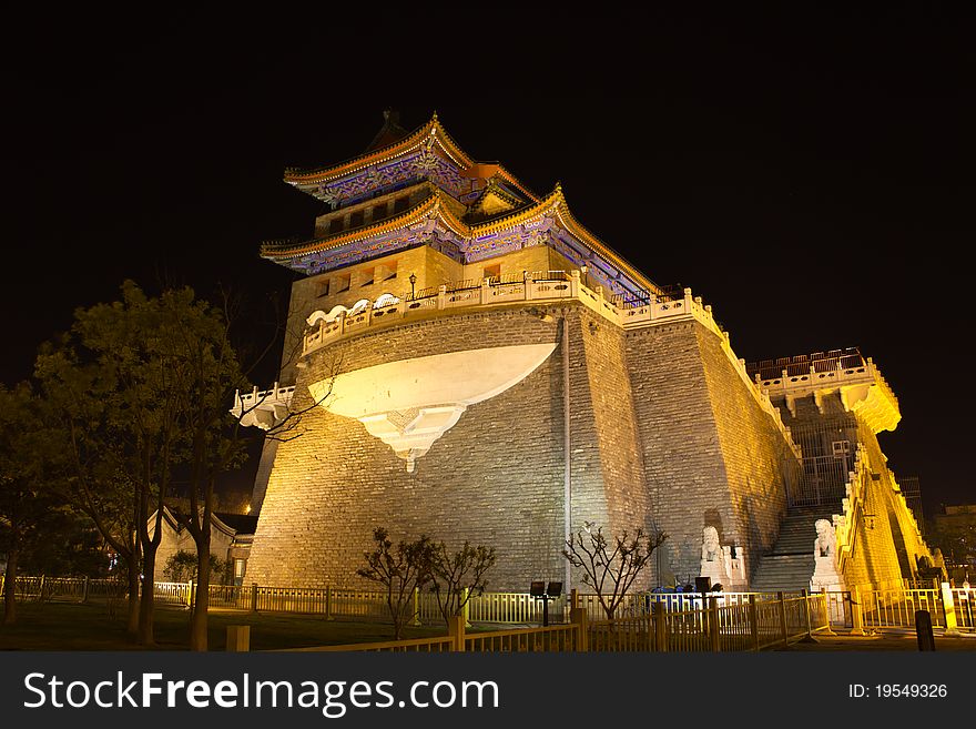 Qianmen (Front Gate) is the colloquial name for Zhengyangmen (meaning gate of the zenith Sun), a gate in Beijing's historic city wall. The gate is situated to the south of Tiananmen Square and once guarded the southern entry into the Inner City. Although much of Beijing's city walls were demolished, Qianmen remains an important geographical marker of the city. The city's central north-south axis p. Qianmen (Front Gate) is the colloquial name for Zhengyangmen (meaning gate of the zenith Sun), a gate in Beijing's historic city wall. The gate is situated to the south of Tiananmen Square and once guarded the southern entry into the Inner City. Although much of Beijing's city walls were demolished, Qianmen remains an important geographical marker of the city. The city's central north-south axis p