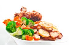 Fried Potatoes With Vegetables And Chicken Stock Photo Fried Potatoes With Vegetables And Chicken Stock Photo
