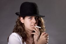 A Vintage Woman Smoking A Cigarette Stock Images