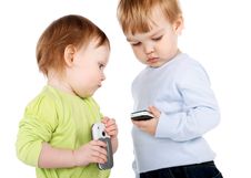 Surprised Little Girl And Boy With The Phone Stock Image