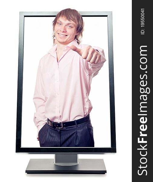 Man's hand with thumb up come out from a screen of a monitor computer. Isolated on white background. Symbol of success concept