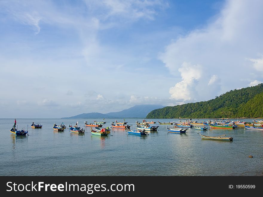 Fishing boats park on near beach