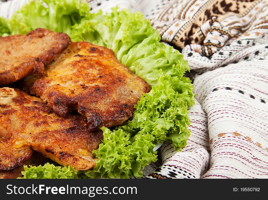 Cutlets on the plate decorated with lettuce