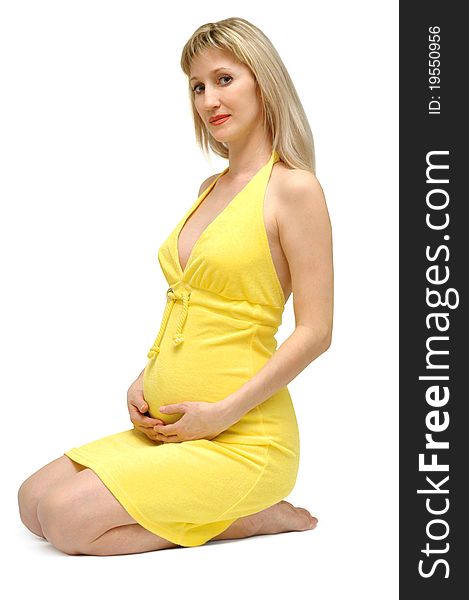 The pregnant woman in yellow