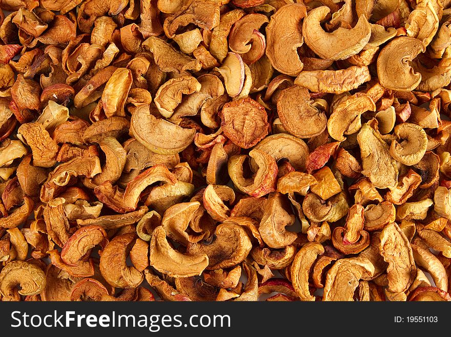 Background of dried slices apples, group of dry slices of apple. Background of dried slices apples, group of dry slices of apple.