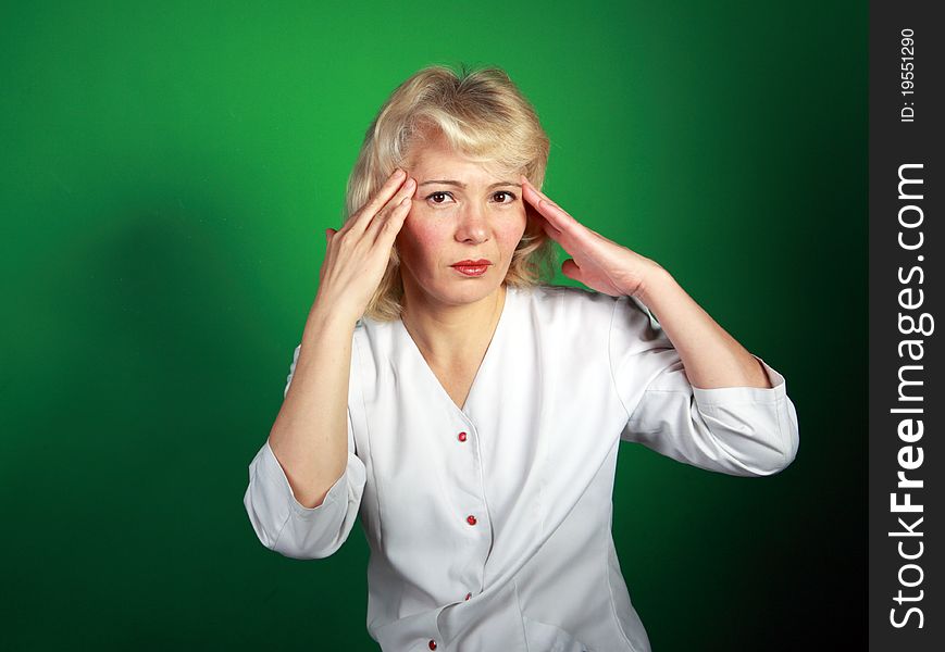 The Woman In A White Dressing With A Headache