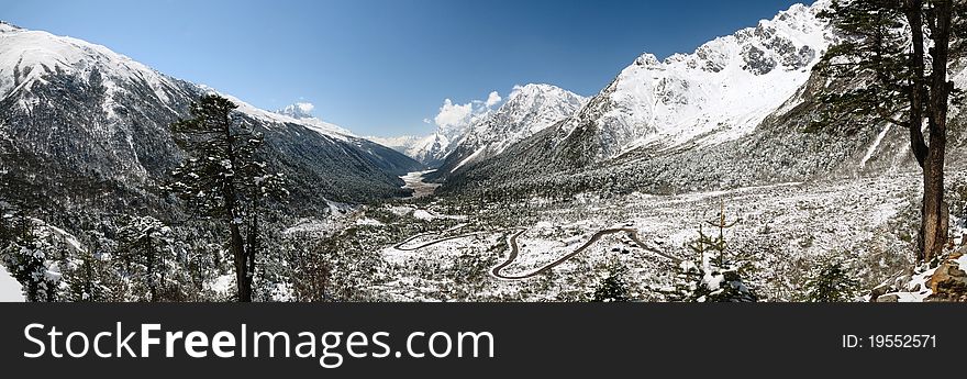 180 degrees panoramic image of Himalayan peaks at Yumthang valley in Sikkim, India. 180 degrees panoramic image of Himalayan peaks at Yumthang valley in Sikkim, India