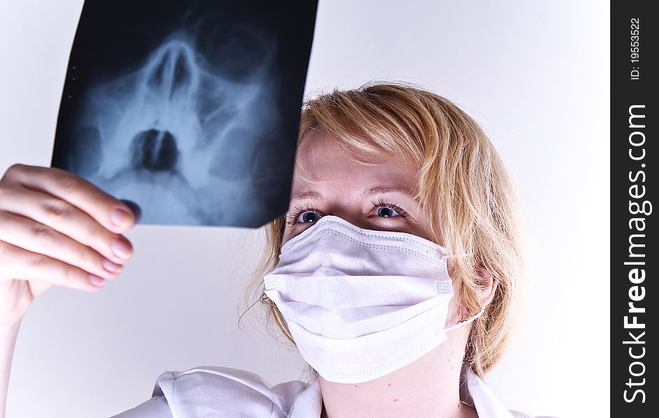 Female doctor looking at a x-ray