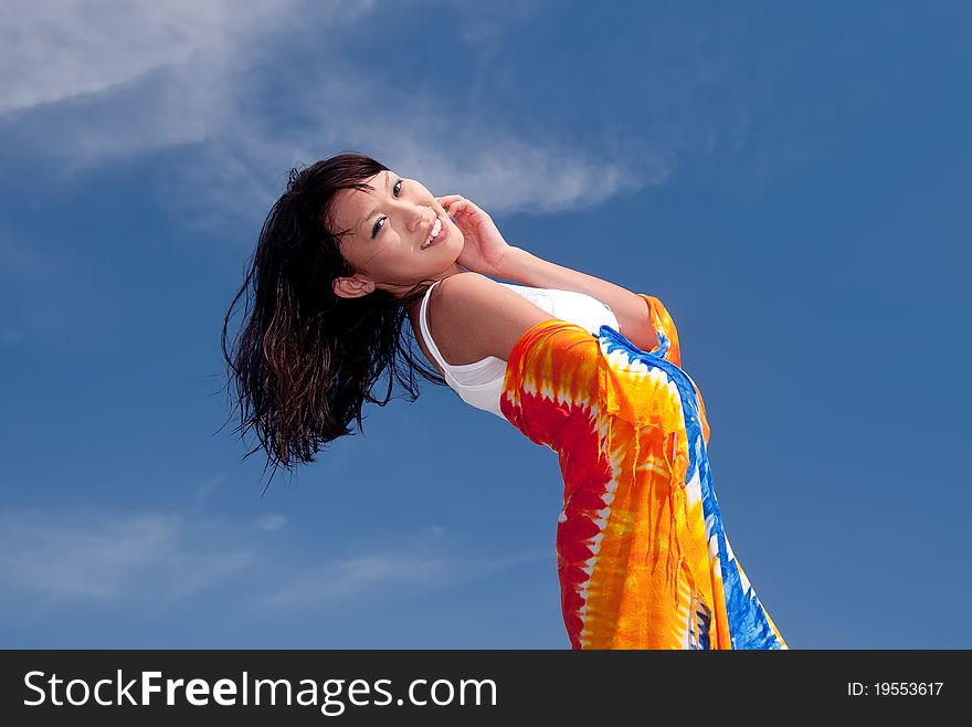 Girl relaxing on a sunny day with a beautiful blue sky in the background. Girl relaxing on a sunny day with a beautiful blue sky in the background