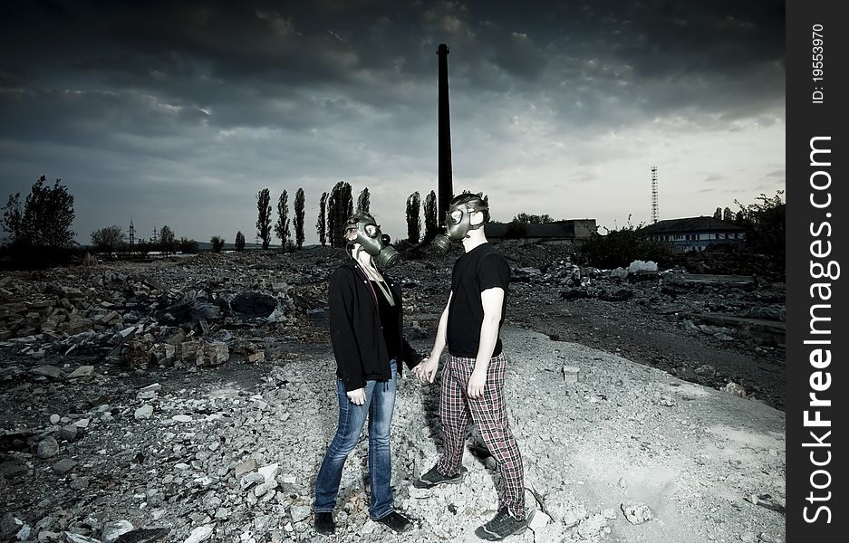 Romantic couple with gas masks