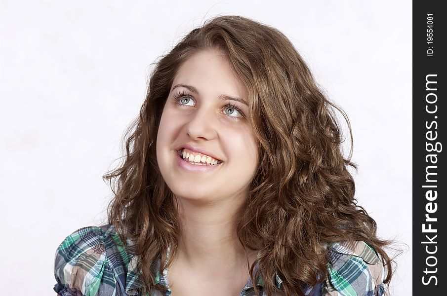 Attractive smiling woman portrait on white background