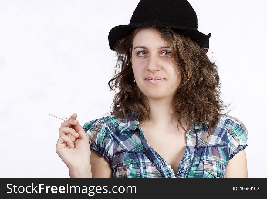 Attractive smiling woman portrait with cigarette on white background. Attractive smiling woman portrait with cigarette on white background