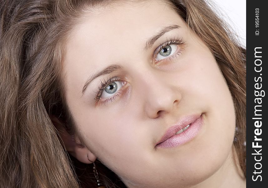 Attractive smiling woman portrait on white background