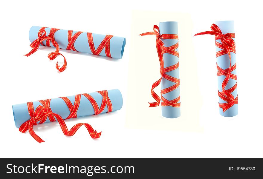 Rolls of a paper are isolated by the fastened red tape on a white background. Rolls of a paper are isolated by the fastened red tape on a white background