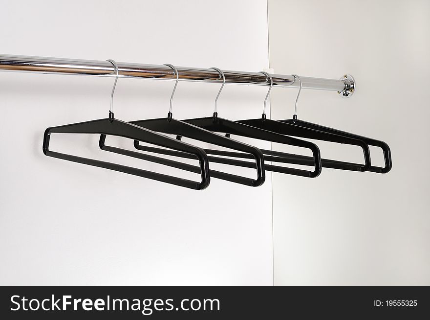 Black simple hangers in the empty case