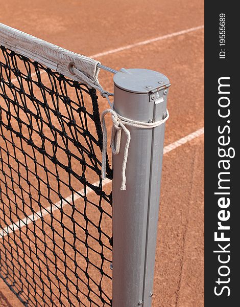 A detail of the system that keeps the tennis net tight.