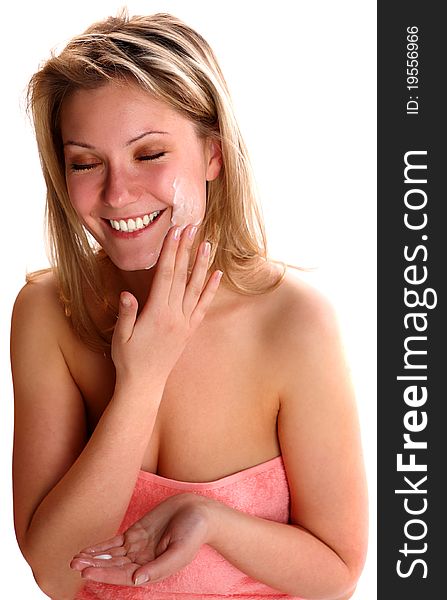 Lovely young woman smiling in a spa salon. Lovely young woman smiling in a spa salon