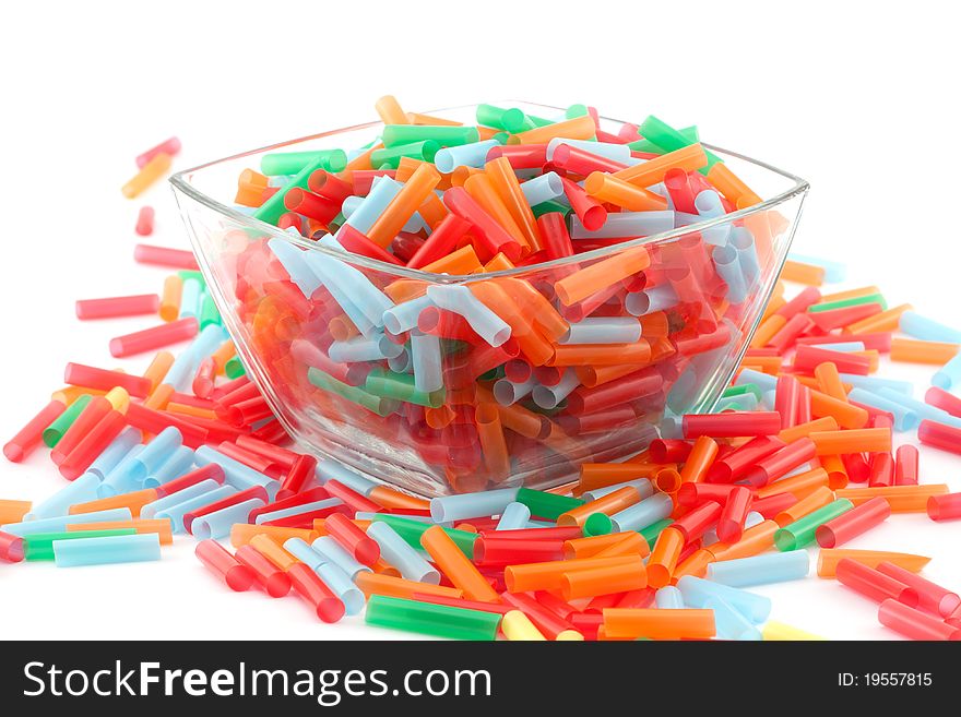 Bunch of colorful straws on white background