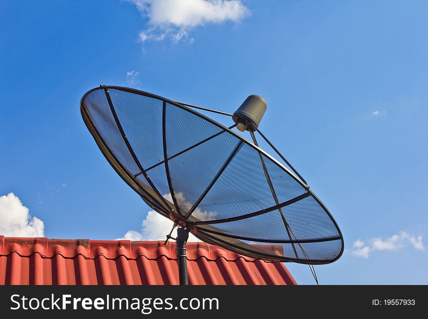 Satellite dish with clear blue sky