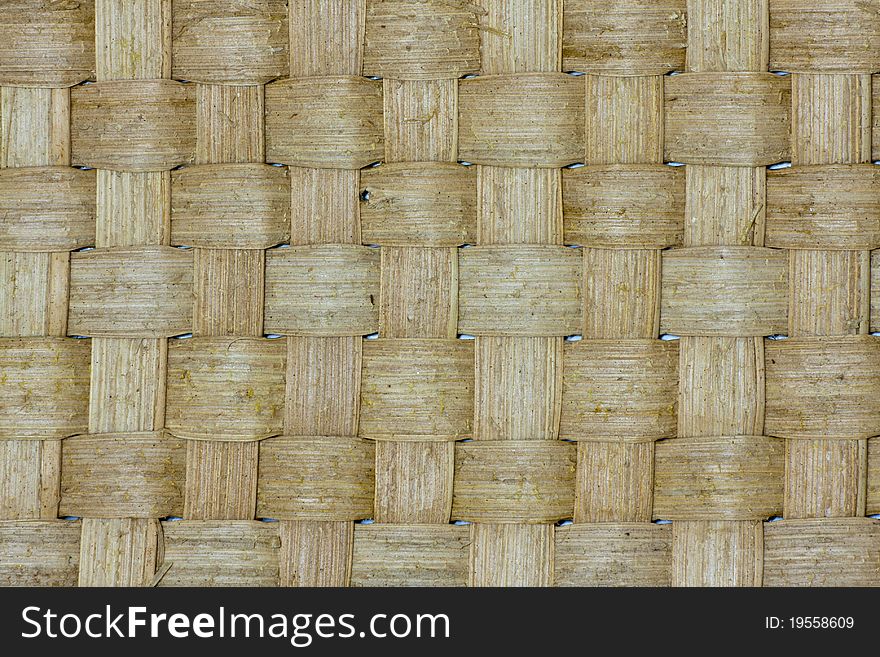 Thai wooden wicker cross pattern texture close up. Thai wooden wicker cross pattern texture close up
