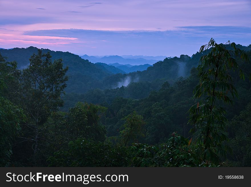 mountains with morning fog in Thailand. mountains with morning fog in Thailand
