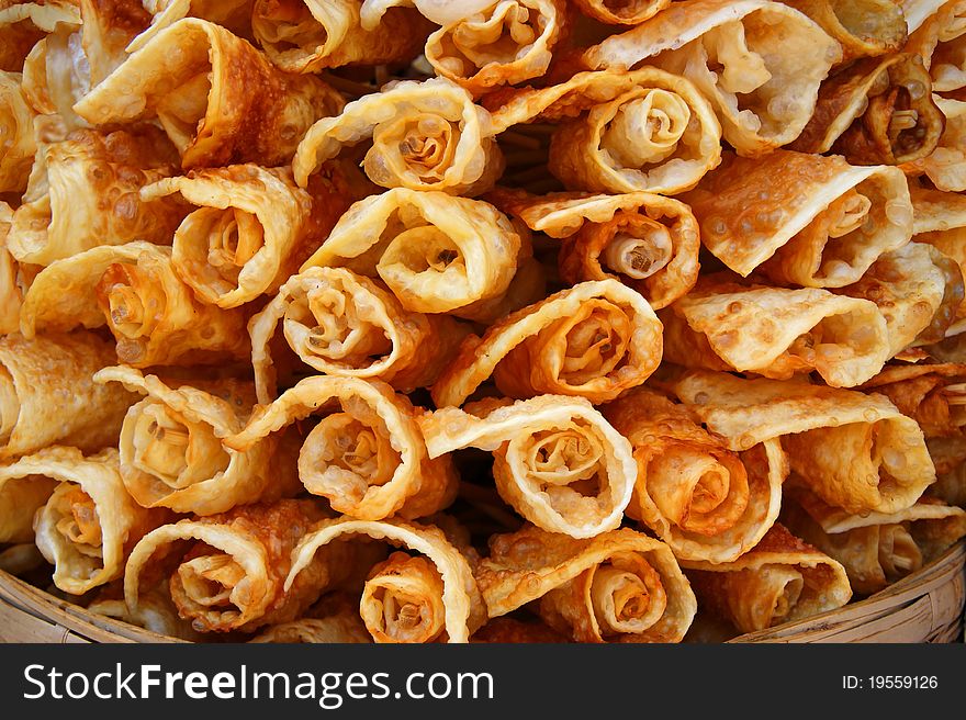 A big basket with rosy cookies. A big basket with rosy cookies.