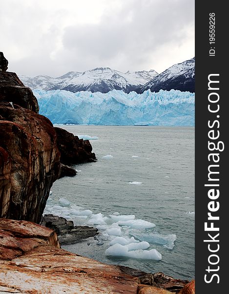 Rocks framing the scenic Perito Moreno. Rocks framing the scenic Perito Moreno