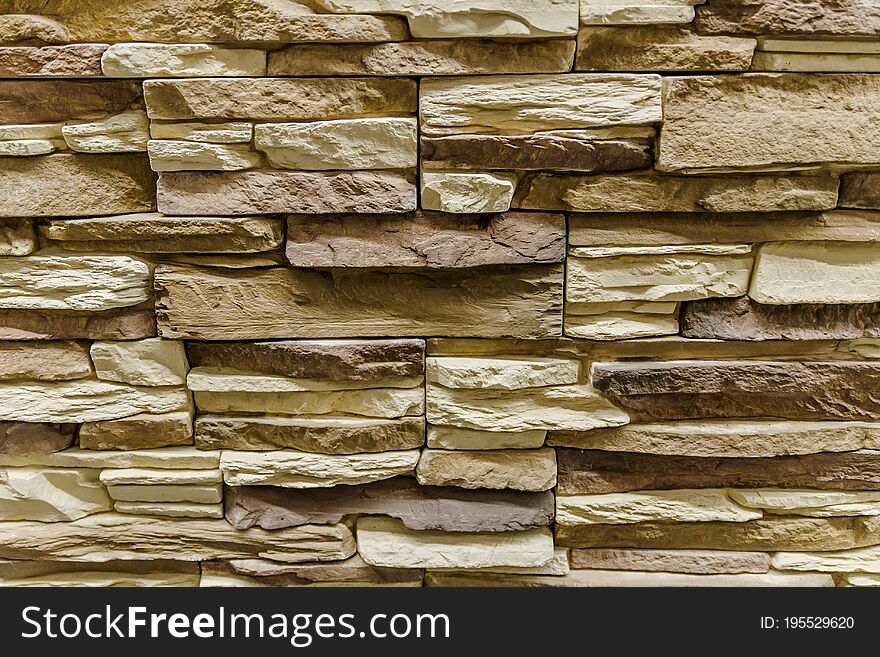 Dark And Light Brown Bricks In Wall Texture