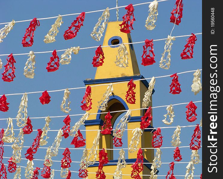 Mexican cut paper decorations with temple in background. Mexican cut paper decorations with temple in background.