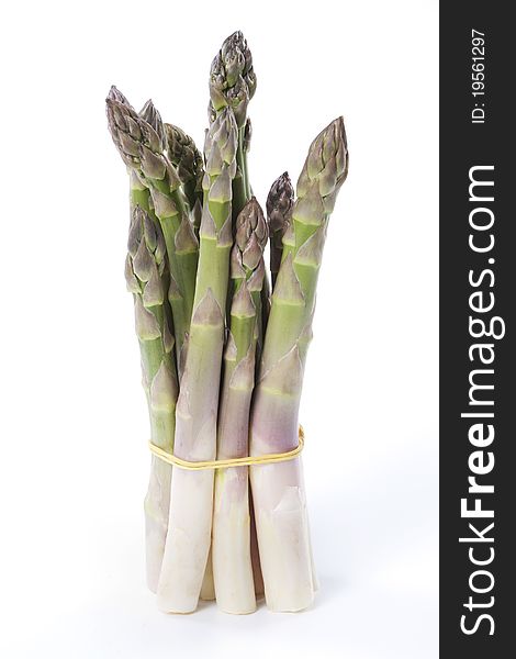 Raw asparagus isolated on a white background
