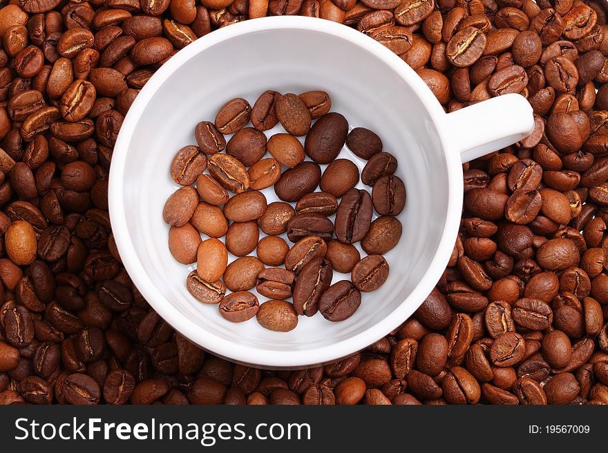 White Cup And Coffee Beans