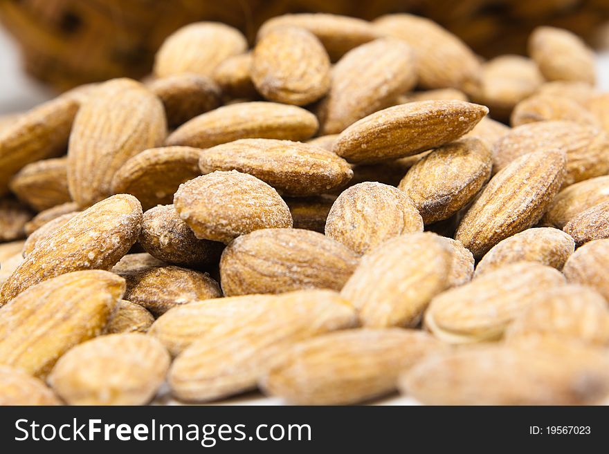 The almonds background. closeup macro. The almonds background. closeup macro