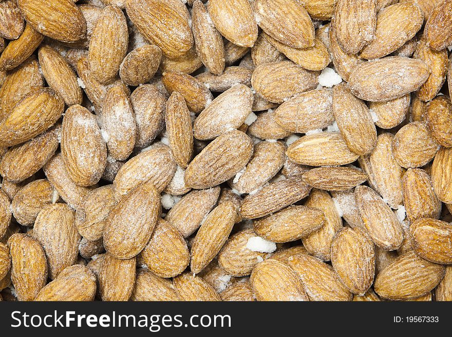 The almonds background. closeup macro almonds in sugar