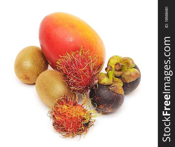 Fresh tropical fruits on white background