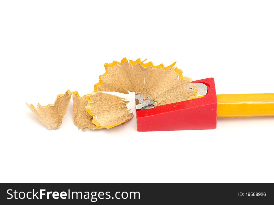 Pencil sharpener with yellow pencil isolated on white background
