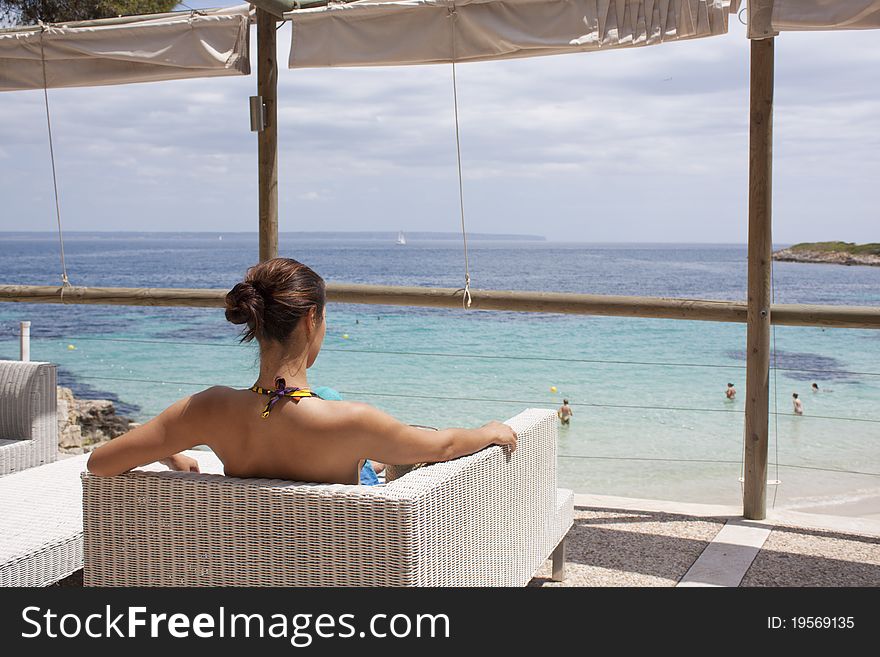 Young woman is enjoying the seaview. Young woman is enjoying the seaview