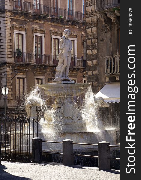 The fountain of Amenano in the city of Catania. The fountain of Amenano in the city of Catania