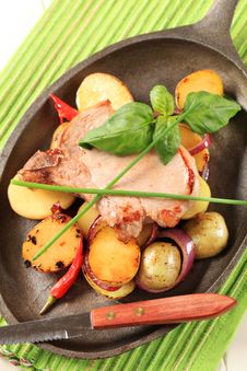Roasted Pork Chop And Potatoes Royalty Free Stock Photography Roasted Pork Chop And Potatoes Royalty Free Stock Photography