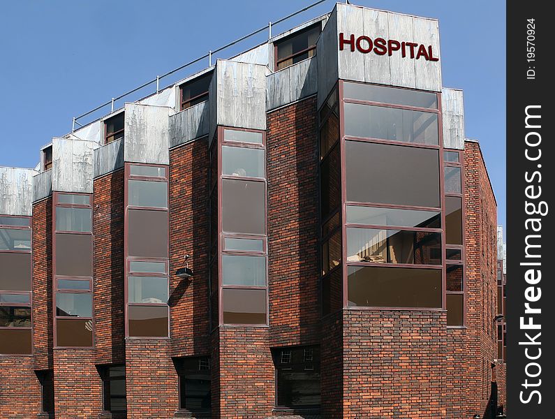 Modern hospital building with sign