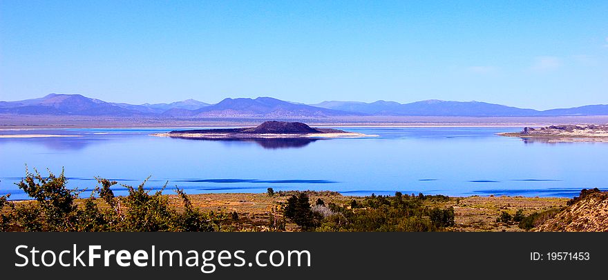 Mono Lake, California. Mono Lake is at least 760,000 years ago as a terminal lake in a basin that has no outlet to the ocean. Because it lacks an outlet, dissolved salts make the lake very alkaline and salty.