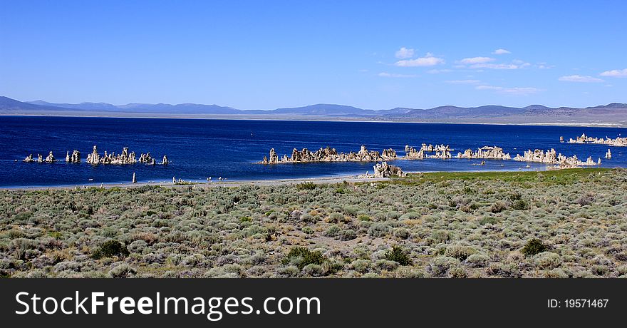 Mono Lake, California. Mono Lake is at least 760,000 years ago as a terminal lake in a basin that has no outlet to the ocean. Because it lacks an outlet, dissolved salts make the lake very alkaline and salty.