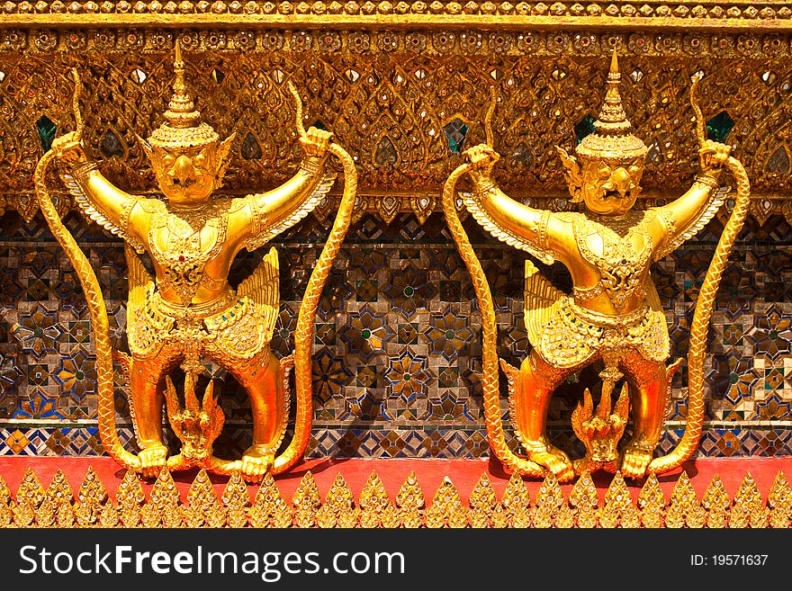 Garuda gold color in the Temple Emerald Church Bangkok Thailand