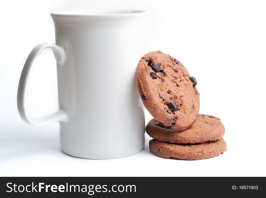 Hot drink and cookies on white