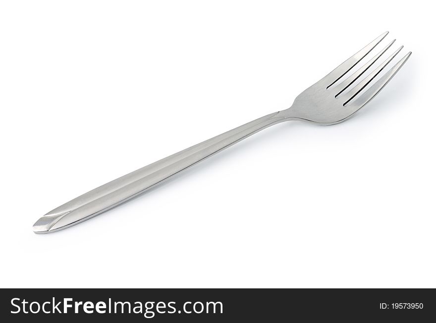 A fork on a white background close up