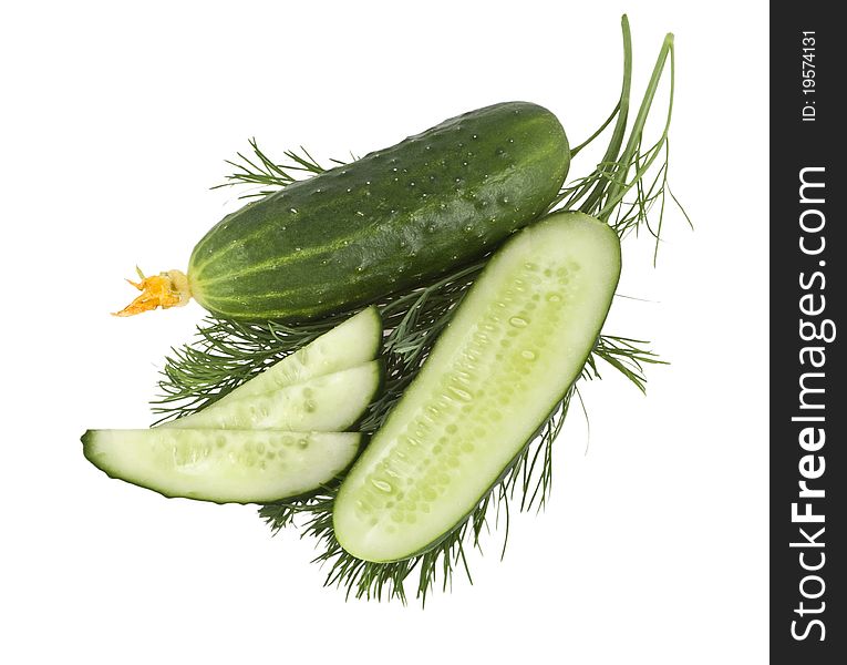 Cucumbers lie on parsley on a white background