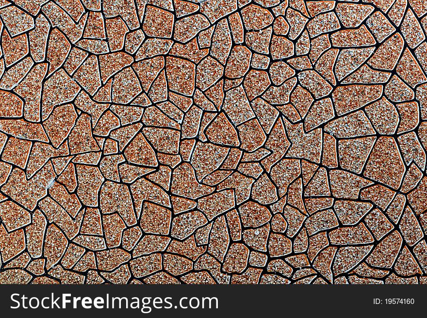 Background of small brown stone tile. Background of small brown stone tile